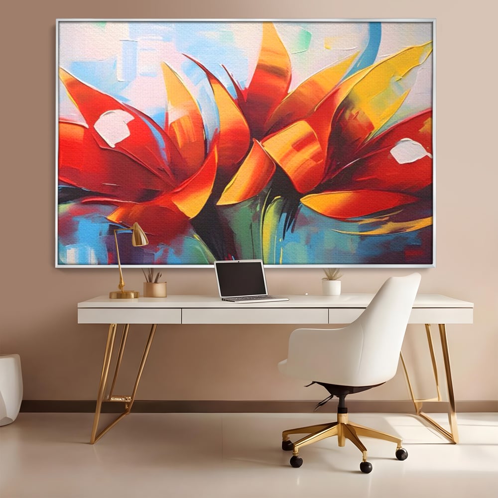 Tablou canvas cu pictura abstracta cu flori portocalii, in rama de aluminiu argintiu, pe perete intr-un birou