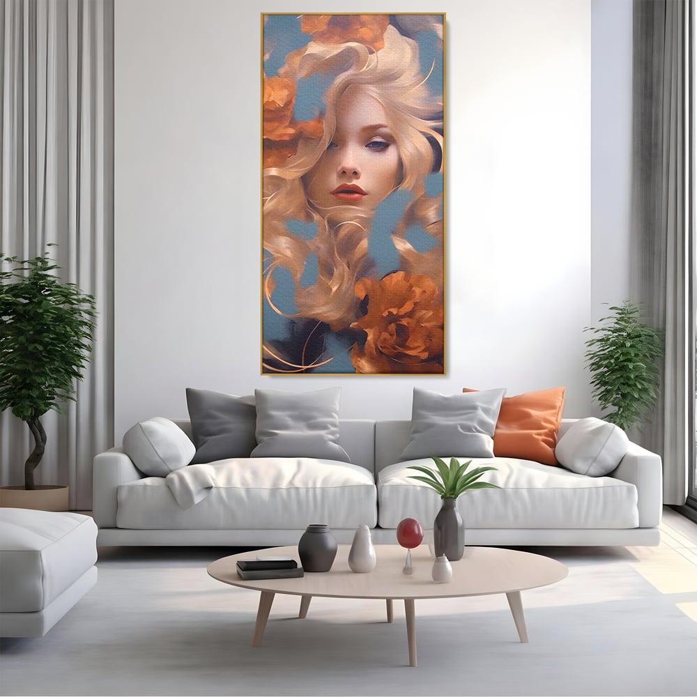 Tablou canvas cu portret de femeie cu flori portocalii, in rama de aluminiu auriu, pe perete intr-un living