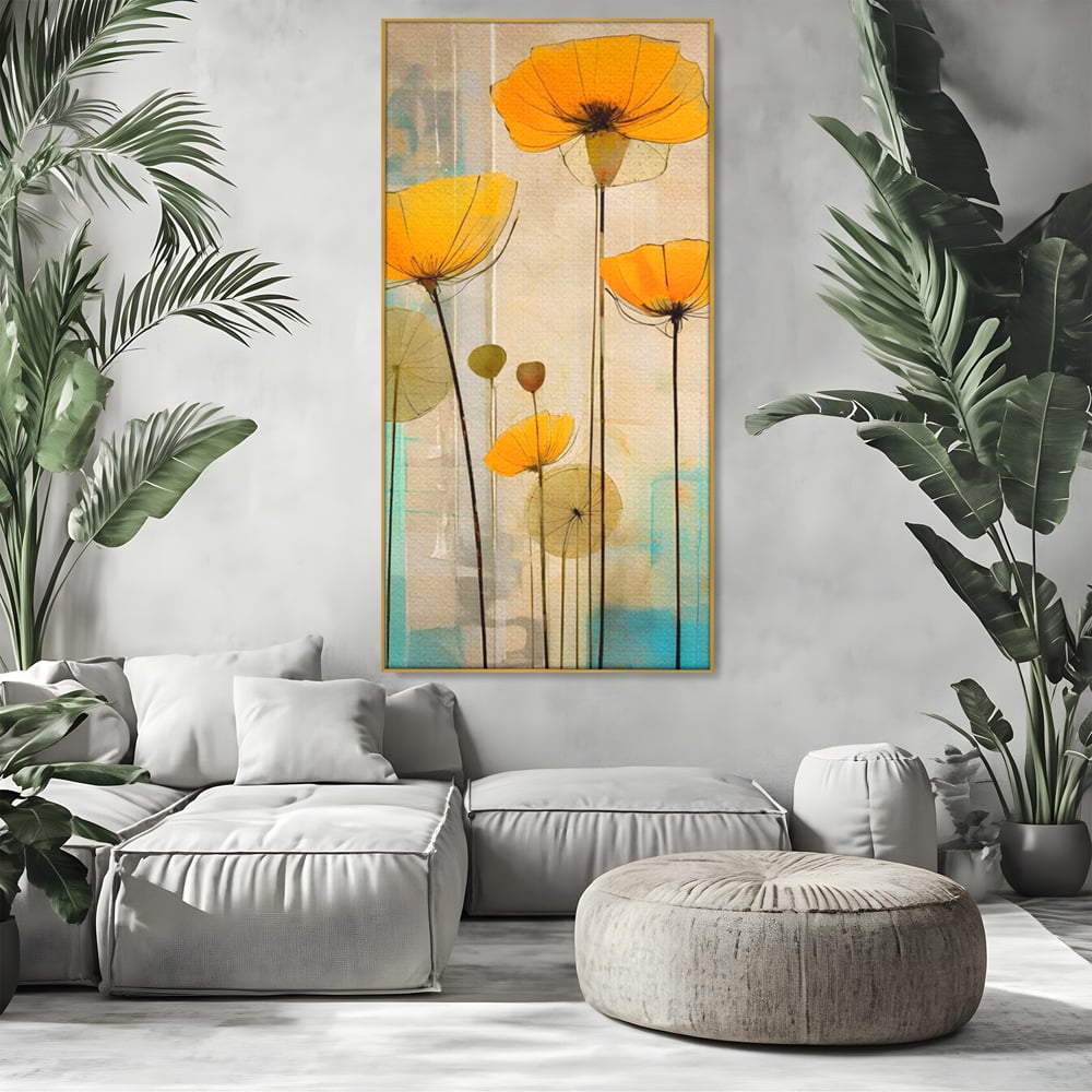 Tablou canvas cu pictura verticala cu flori galbene, in rama de aluminiu auriu, pe perete intr-un living