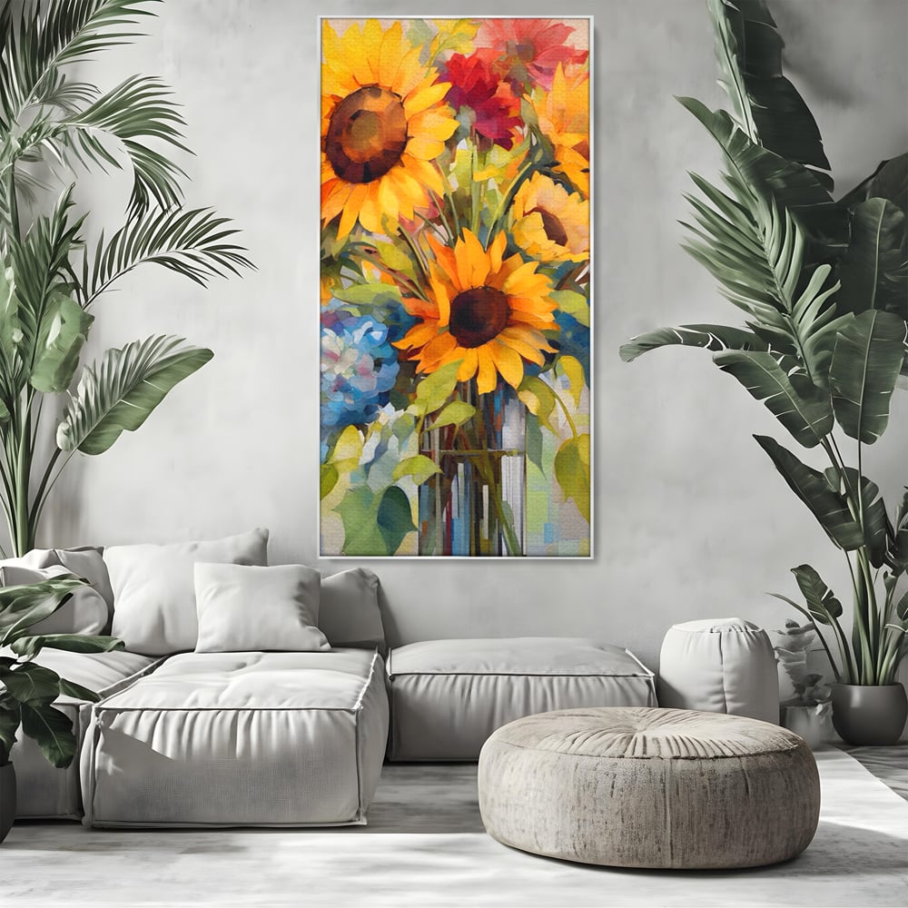 Tablou canvas cu pictura cu floarea-soarelui si flori de camp, in rama de aluminiu argintiu, pe perete intr-un living