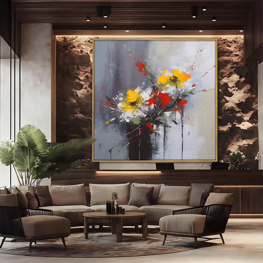 Tablou canvas cu tablou pictat abstract cu flori, in rama de aluminiu auriu, pe perete intr-un birou
