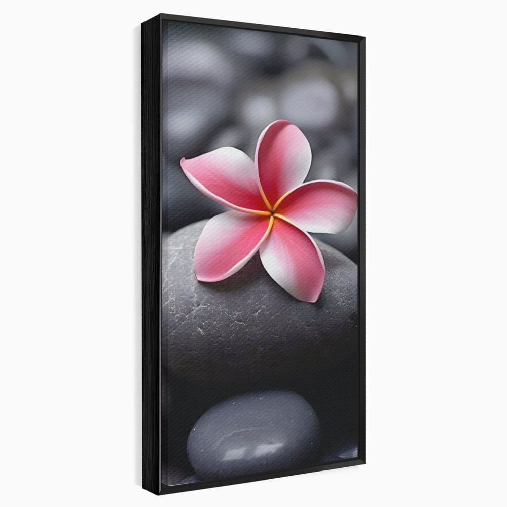 Tablou canvas cu floare roz pe pietre gri, in rama de aluminiu negru