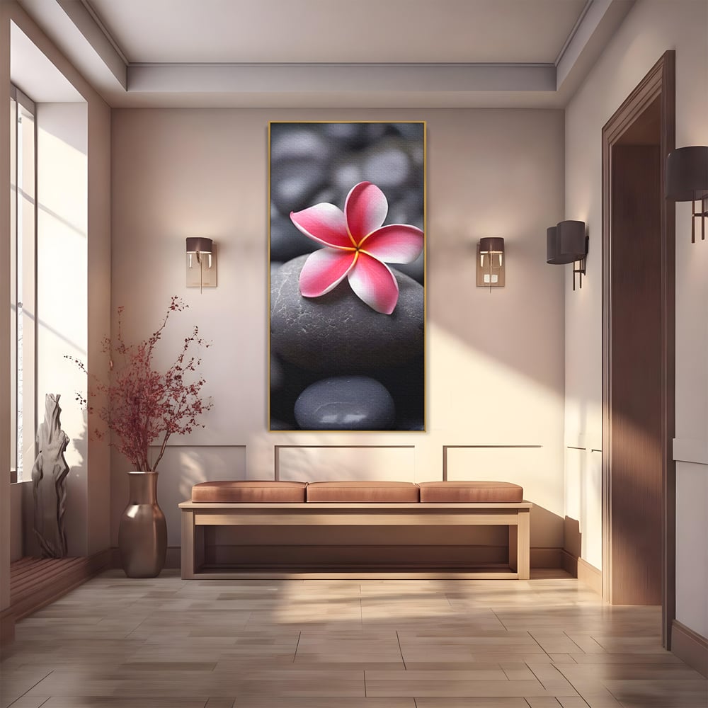 Tablou canvas cu floare roz pe pietre gri, in rama de aluminiu auriu