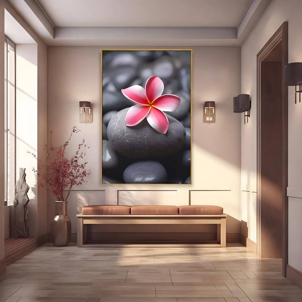 Tablou canvas cu floare roz pe pietre gri, in rama de aluminiu auriu