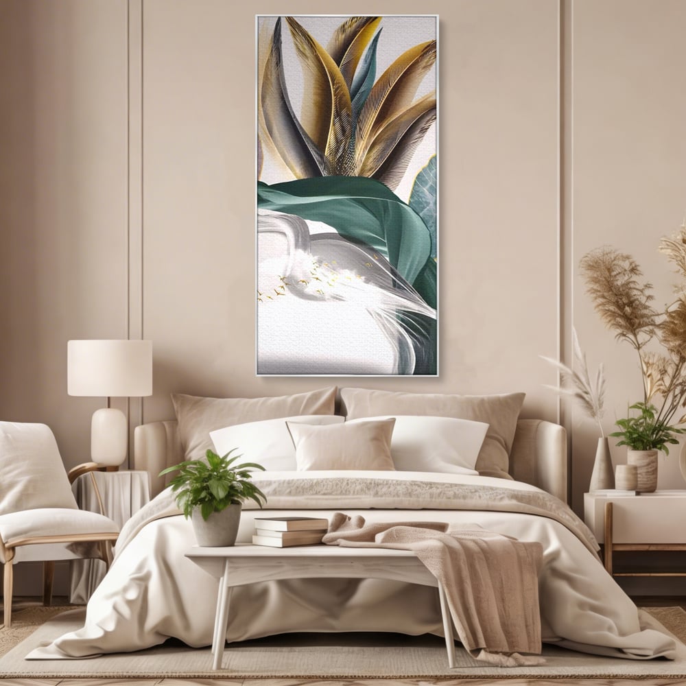 Tablou canvas cu tablou vertical cu pene si frunza, in rama de aluminiu argintiu, pe perete intr-un dormitor
