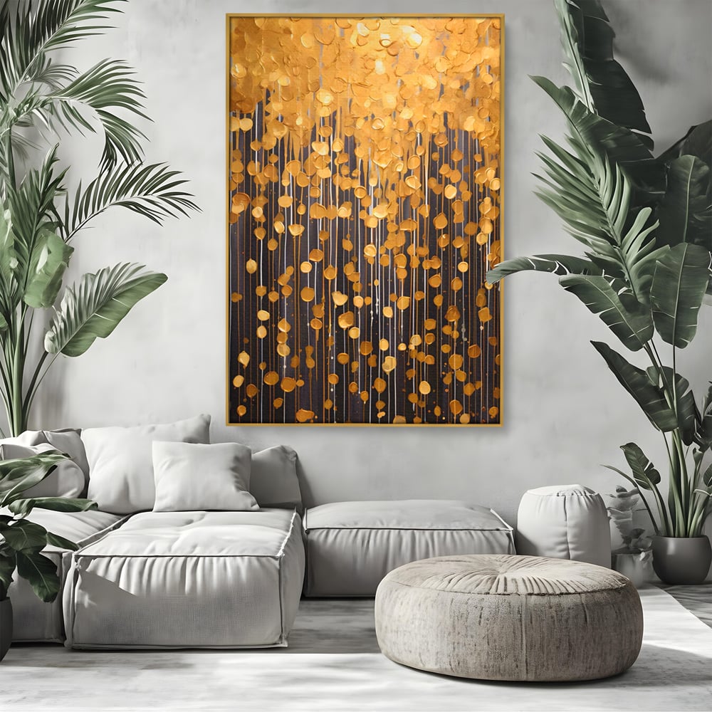 Tablou canvas cu pictura abstracta cu picaturi aurii, in rama de aluminiu auriu, pe perete intr-un living
