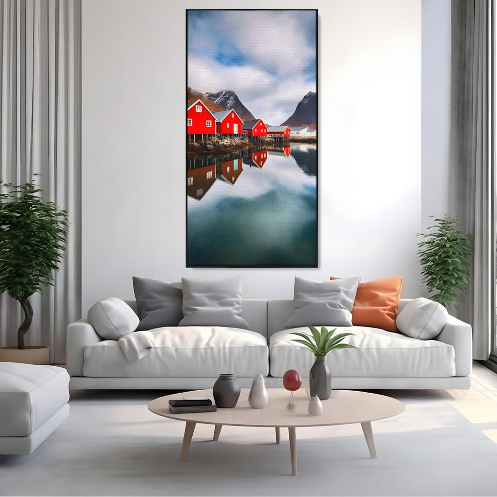 Tablou canvas cu tablou canvas cu cabane rosii, in rama de aluminiu negru, pe perete intr-un living