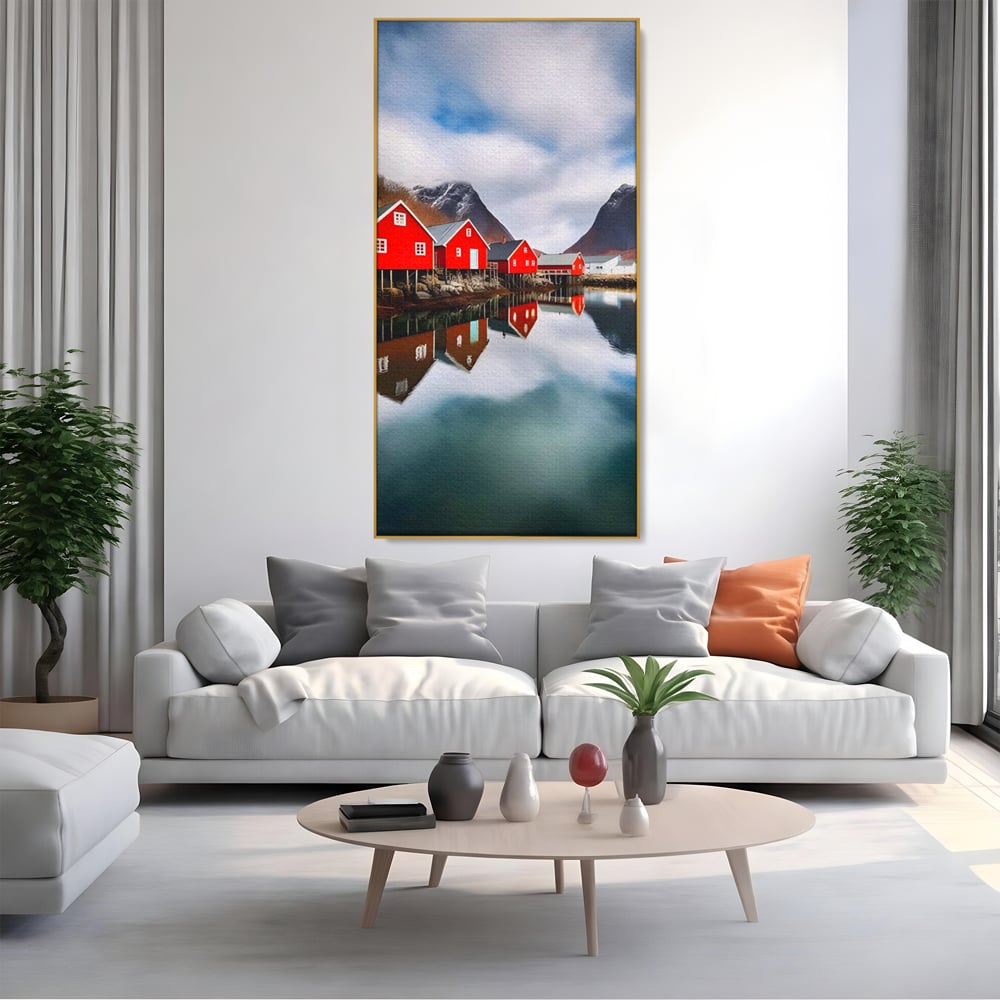 Tablou canvas cu tablou canvas cu cabane rosii, in rama de aluminiu auriu, pe perete intr-un living