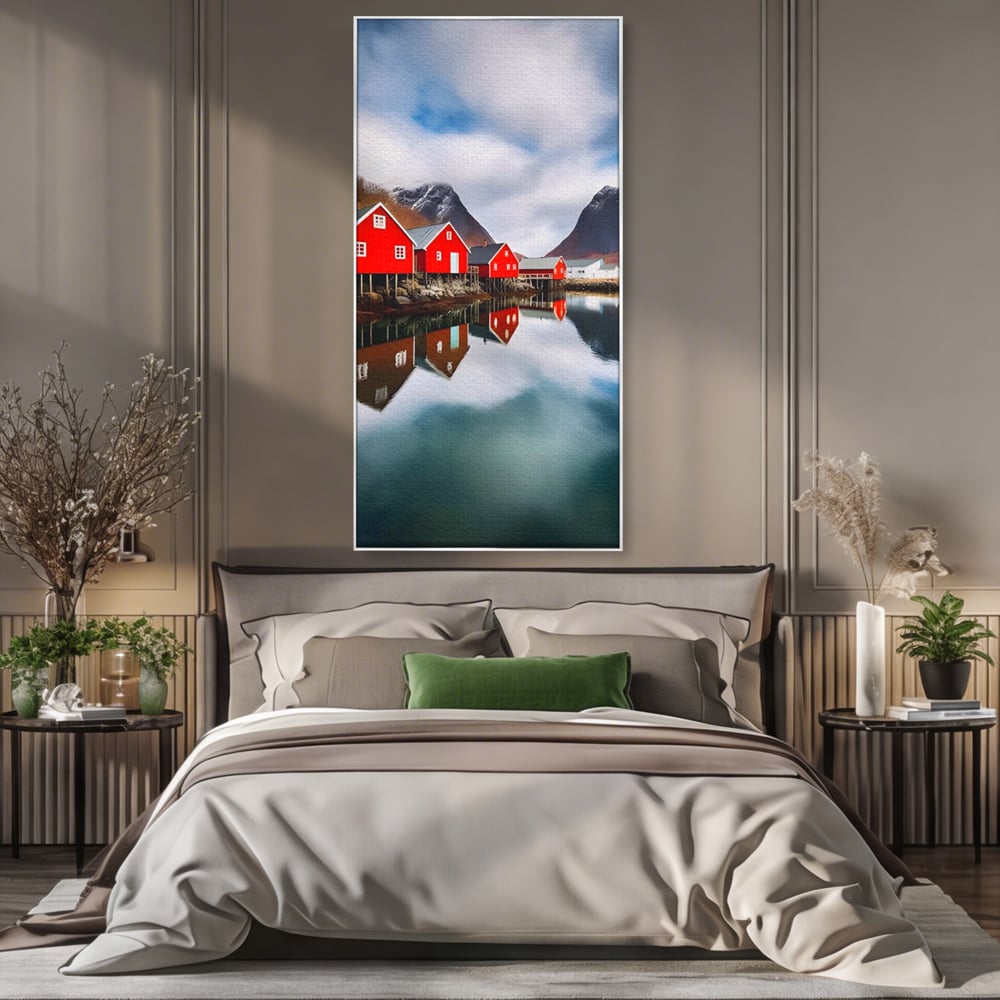 Tablou canvas cu tablou canvas cu cabane rosii, in rama de aluminiu argintiu, pe perete intr-un dormitor