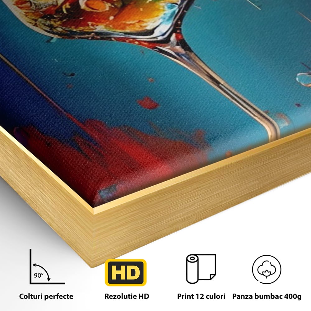 Detaliu al suprafetei: tablou canvas cu pahar de cocktail si stropi colorati, in rama de aluminiu auriu