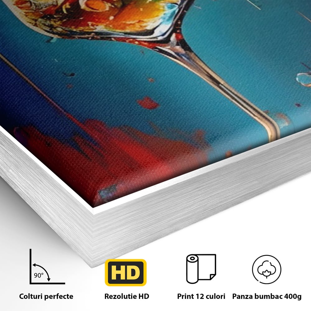 Detaliu al suprafetei: tablou canvas cu pahar de cocktail si stropi colorati, in rama de aluminiu argintiu