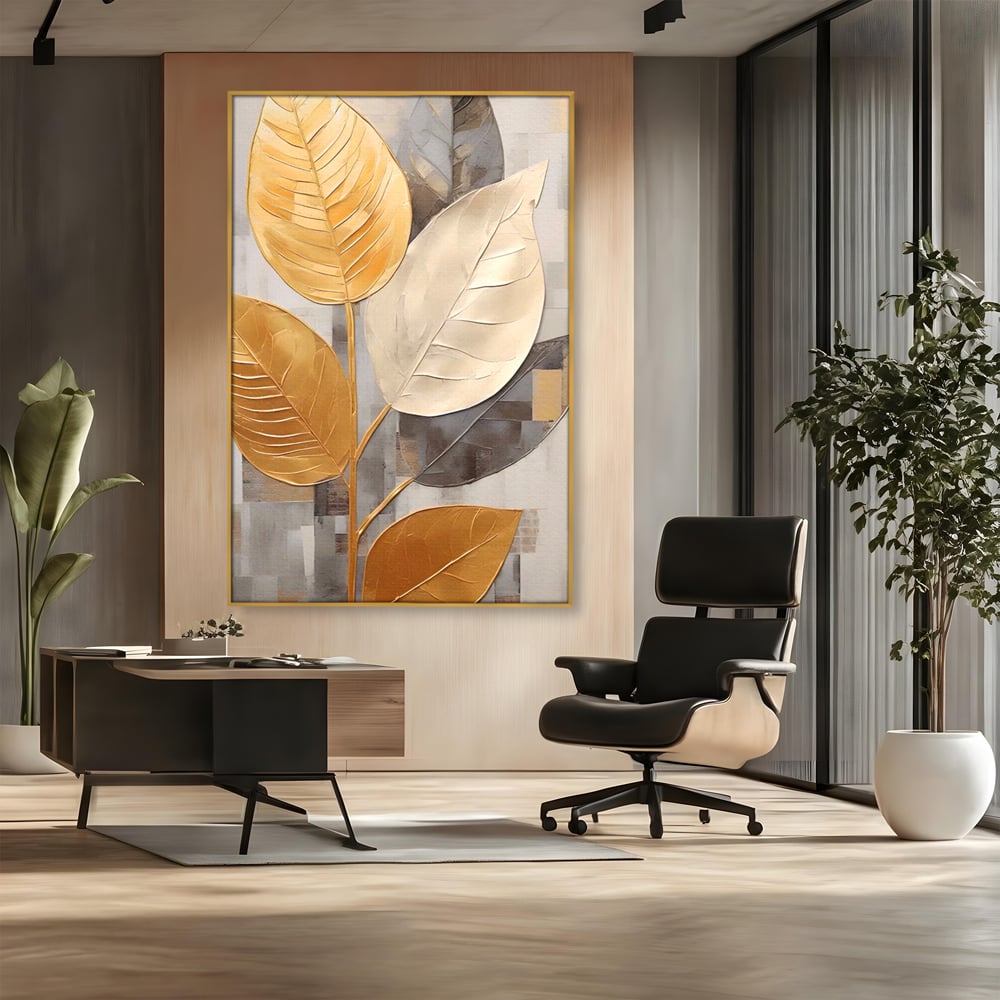 Tablou canvas cu tablou canvas cu frunze aurii texturate, in rama de aluminiu auriu, pe perete intr-un birou