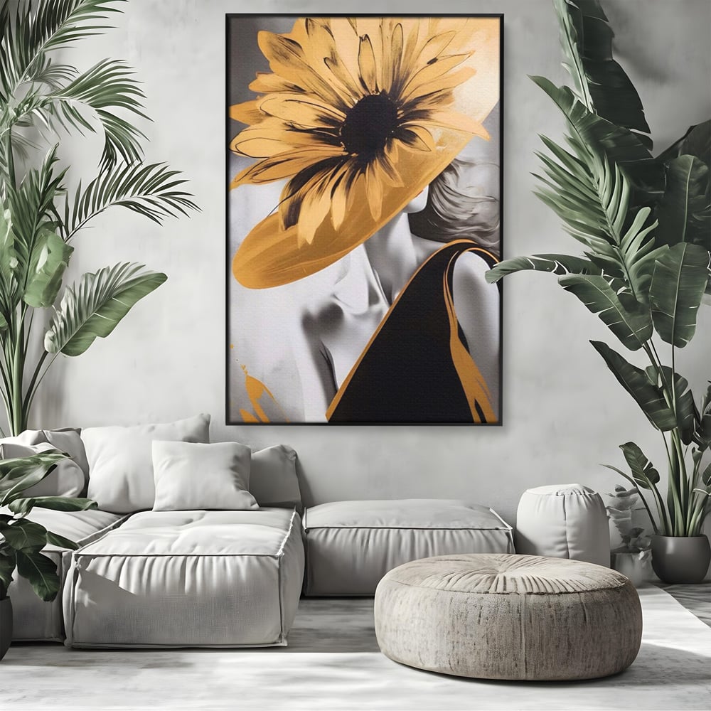 Tablou canvas cu tablou canvas cu portret de femeie si floarea-soarelui, in rama de aluminiu negru, pe perete intr-un living