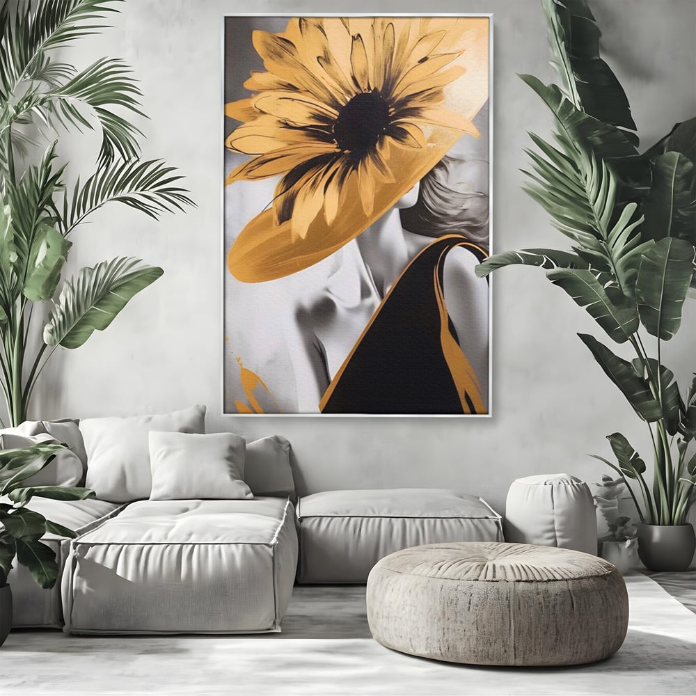 Tablou canvas cu tablou canvas cu portret de femeie si floarea-soarelui, in rama de aluminiu argintiu, pe perete intr-un living