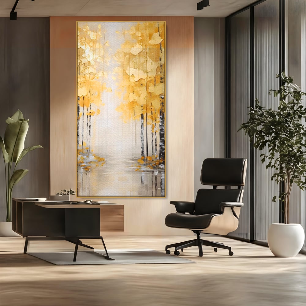 Tablou canvas cu pictura verticala cu padure aurie, in rama de aluminiu auriu, pe perete intr-un birou