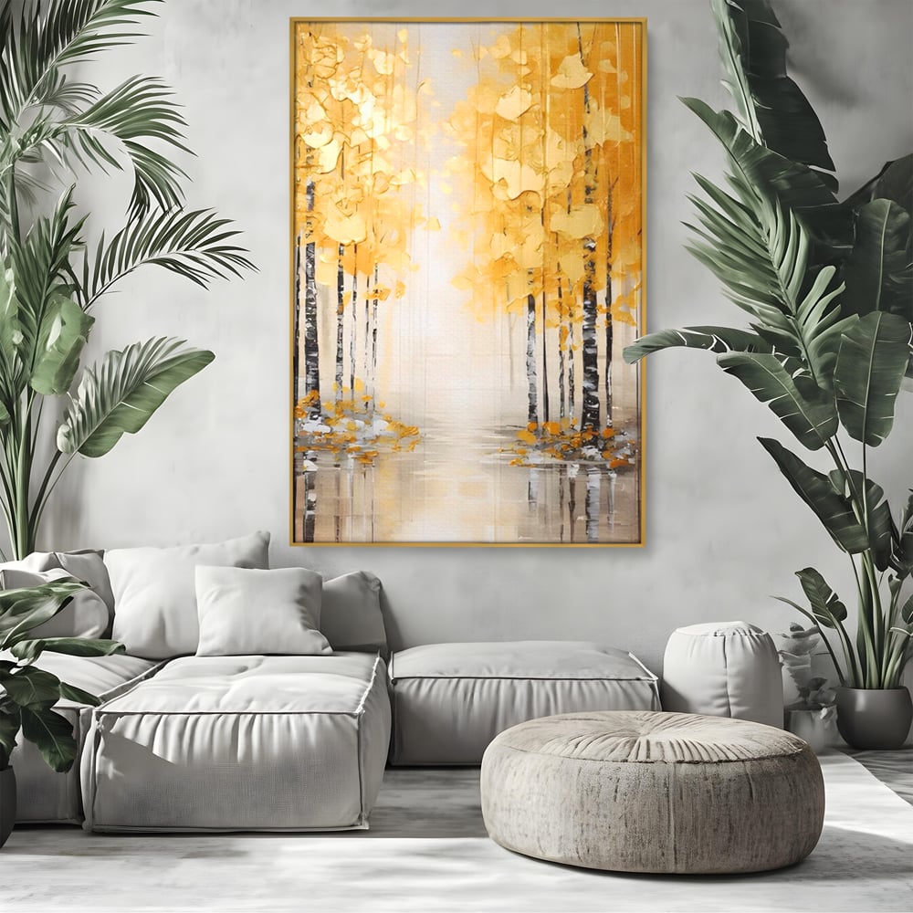 Tablou canvas cu pictura verticala cu padure aurie, in rama de aluminiu auriu, pe perete intr-un living