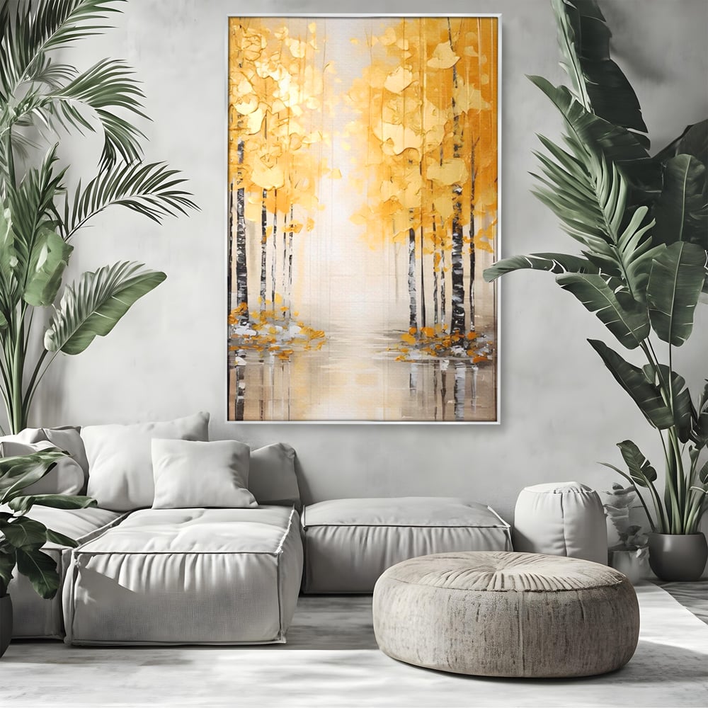 Tablou canvas cu pictura verticala cu padure aurie, in rama de aluminiu argintiu, pe perete intr-un living