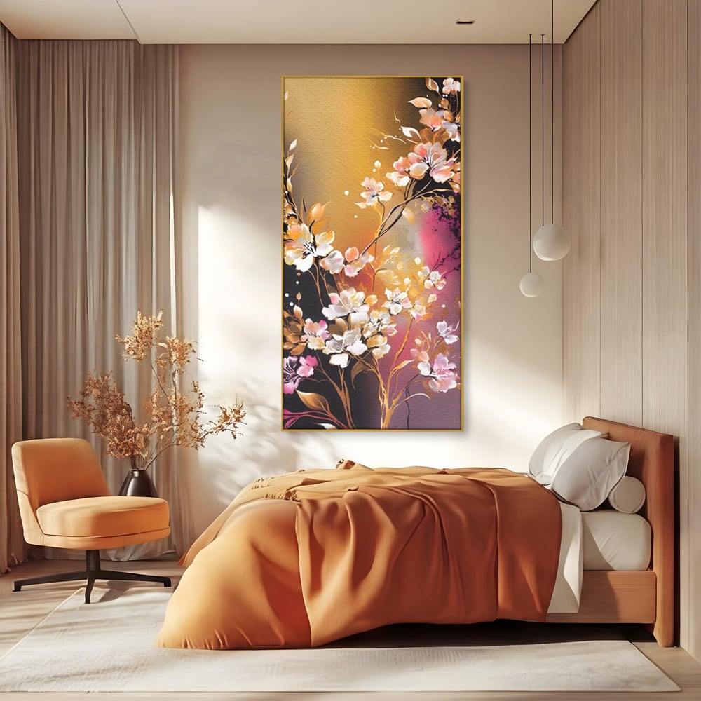 Tablou canvas cu pictura verticala cu ramura inflorita, in rama de aluminiu auriu, pe perete intr-un dormitor