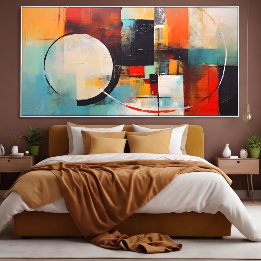 Tablou canvas cu pictura abstracta cu cercuri si linii, in rama de aluminiu argintiu, pe perete intr-un dormitor
