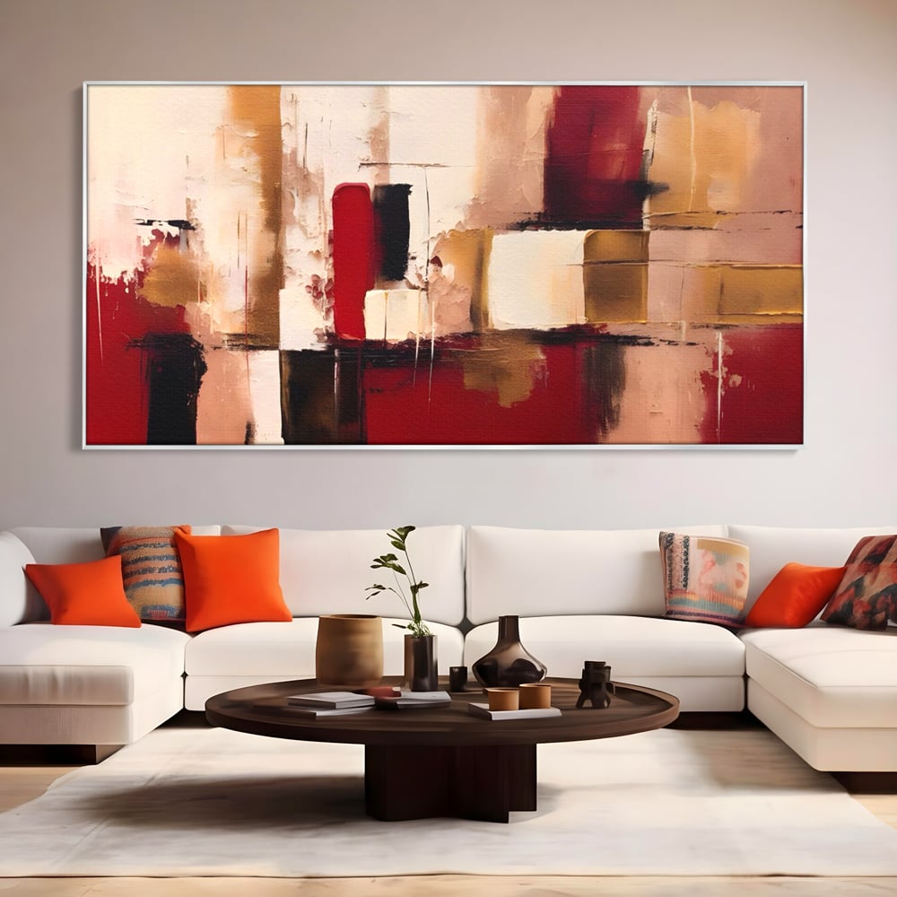 Tablou canvas cu pictura abstracta cu patrate rosii si bej, in rama de aluminiu argintiu, pe perete intr-un living