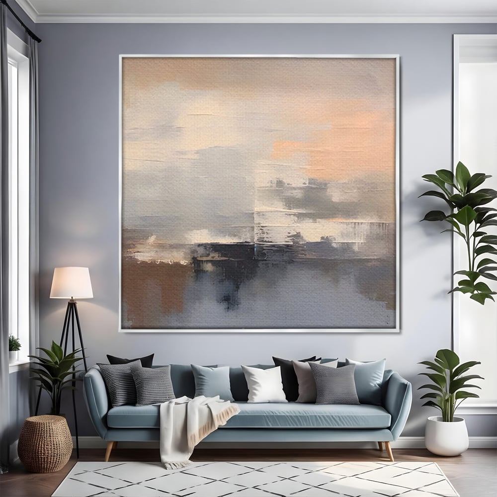 Tablou canvas cu pictura abstracta cu peisaj orizonal, in rama de aluminiu argintiu, pe perete intr-un living