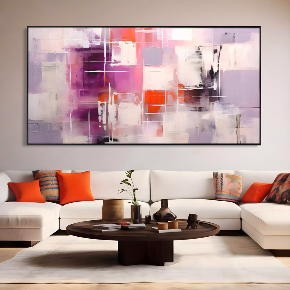 Tablou canvas cu pictura abstracta cu pete mov, in rama de aluminiu negru, pe perete intr-un living