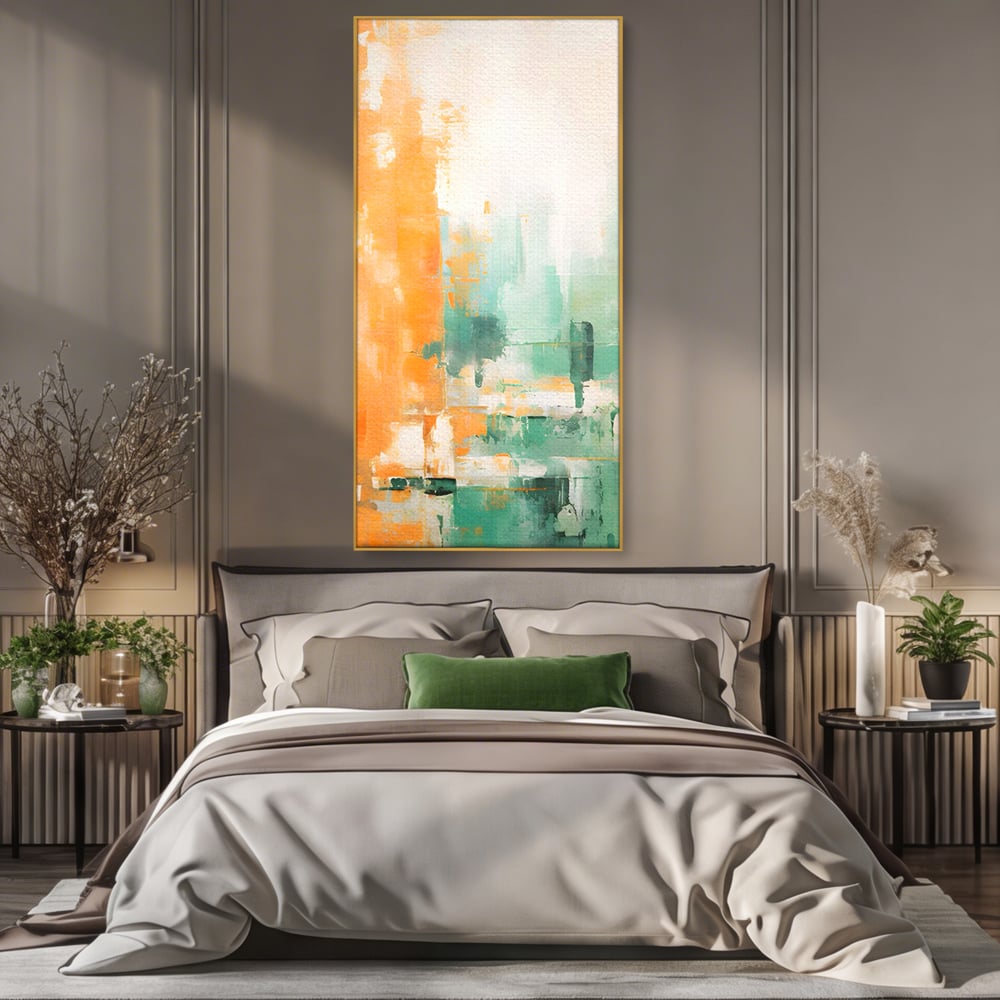 Tablou canvas cu pictura abstracta cu portocaliu si turcoaz, in rama de aluminiu auriu, pe perete intr-un dormitor