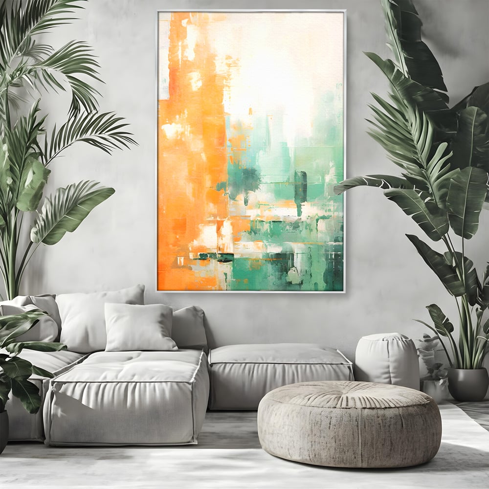Tablou canvas cu pictura abstracta cu portocaliu si turcoaz, in rama de aluminiu argintiu, pe perete intr-un living