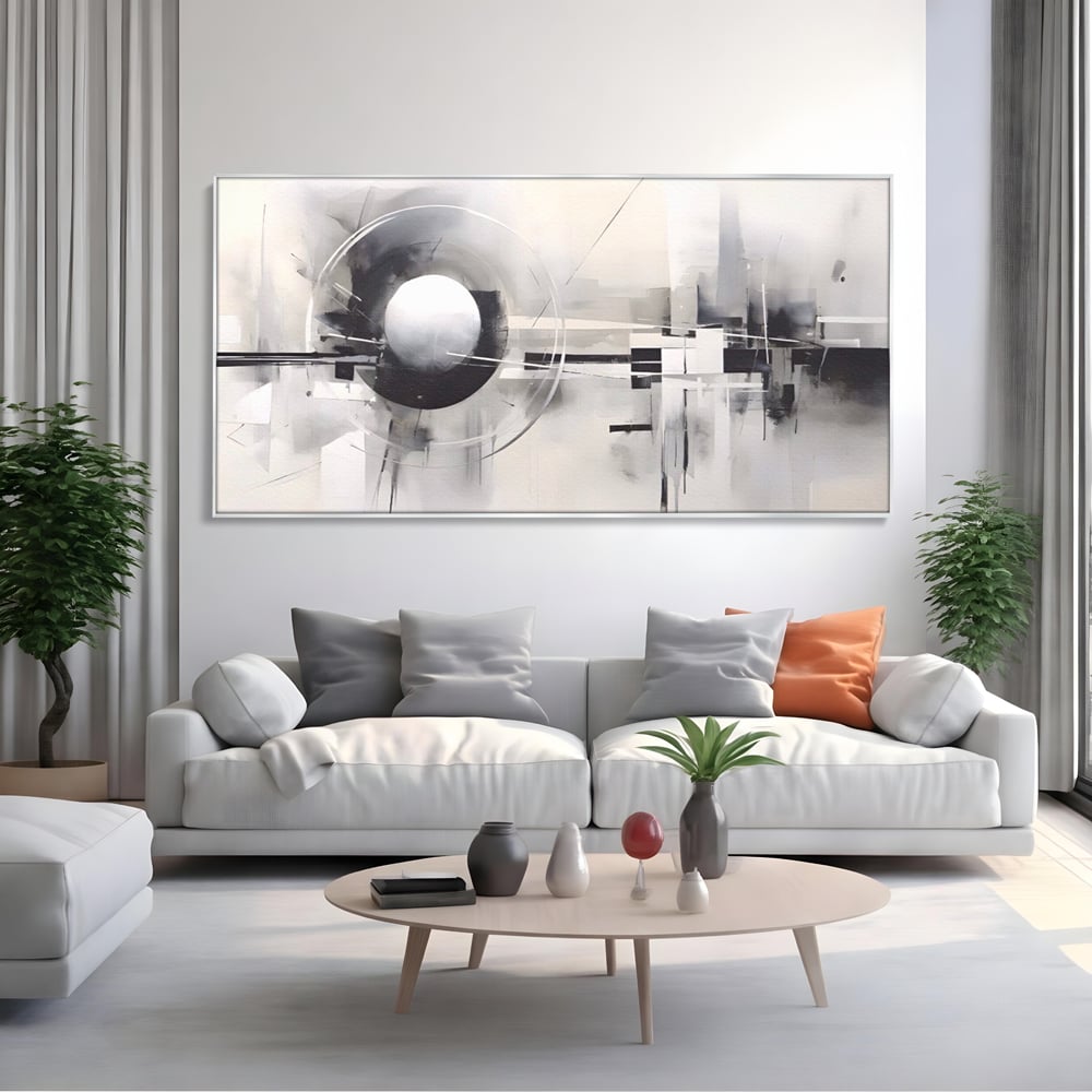 Tablou canvas cu pictura abstracta cu sfera si cercuri, in rama de aluminiu argintiu, pe perete intr-un living