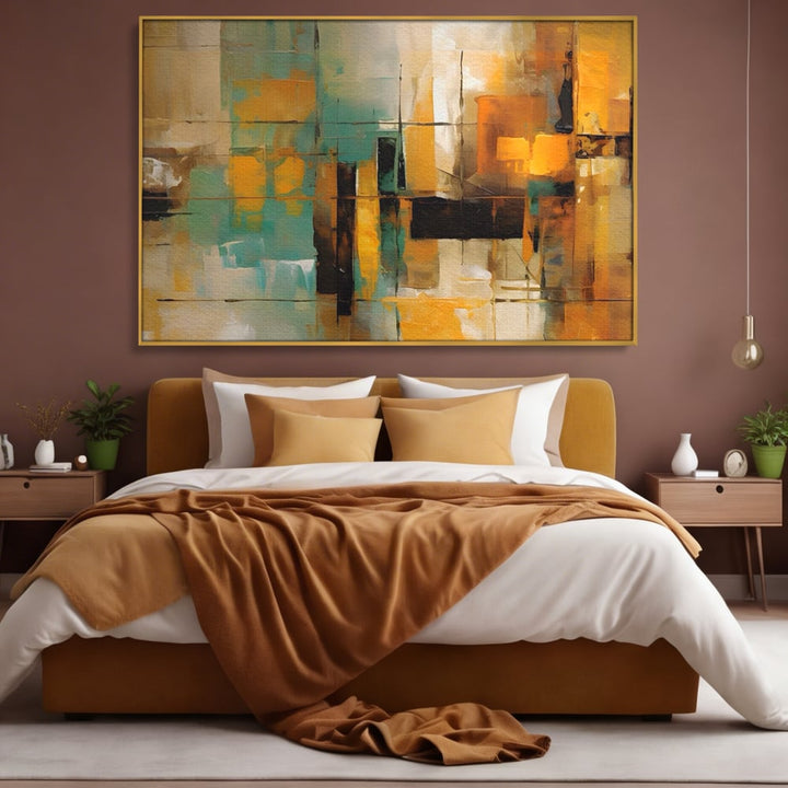 Tablou canvas cu pictura abstracta cu linii si portocaliu, in rama de aluminiu auriu, pe perete intr-un dormitor