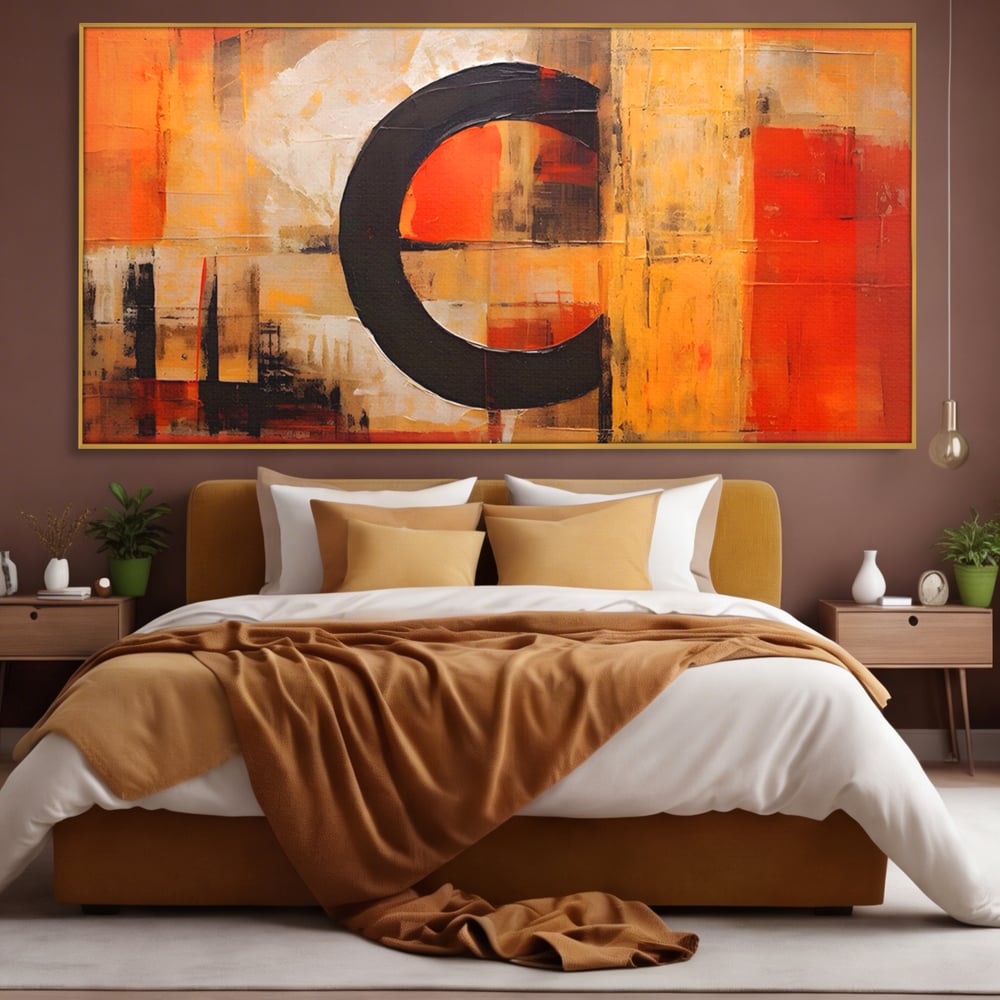 Tablou canvas cu pictura abstracta cu cerc negru, in rama de aluminiu auriu, pe perete intr-un dormitor