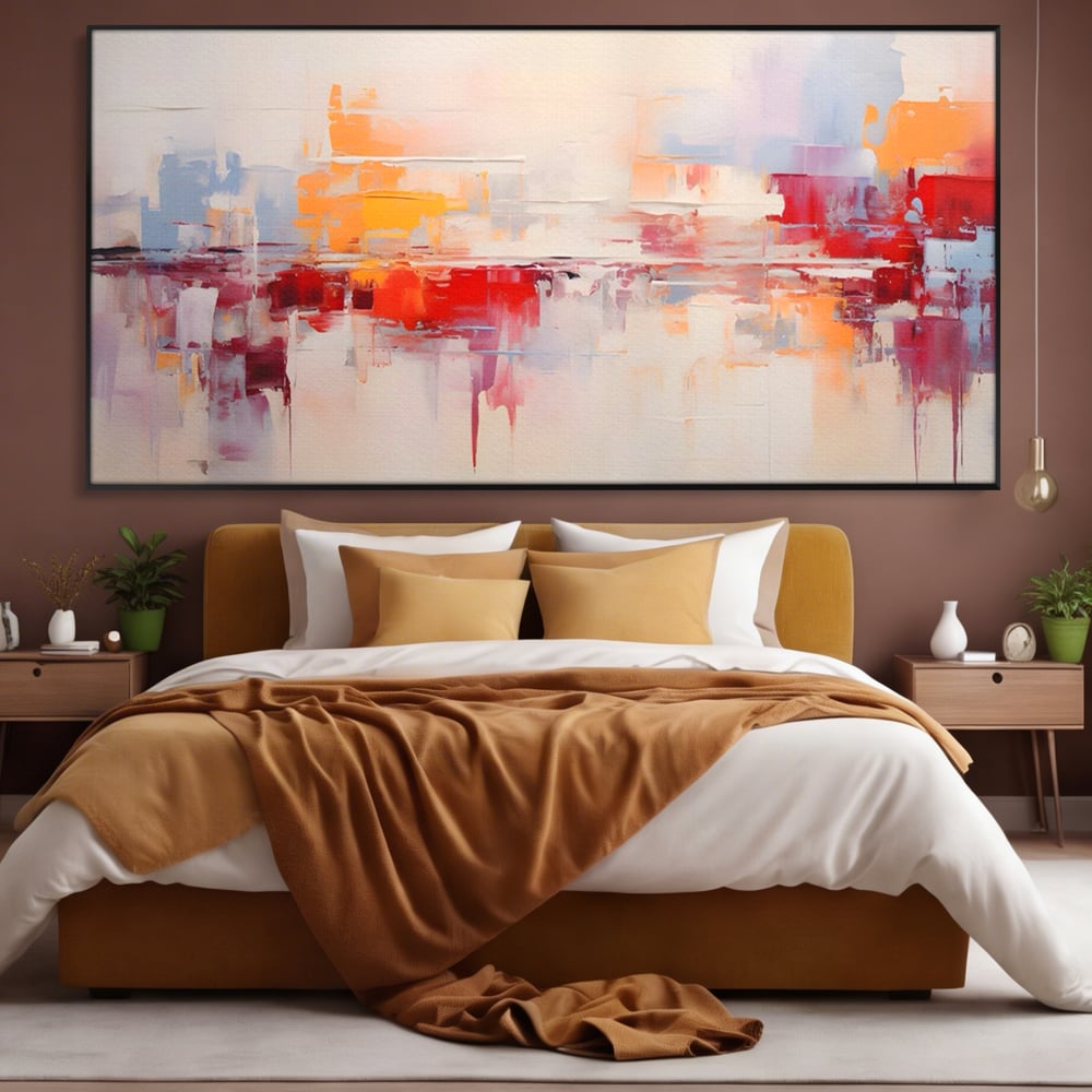 Tablou canvas cu pictura abstracta cu reflexii colorate, in rama de aluminiu negru, pe perete intr-un dormitor