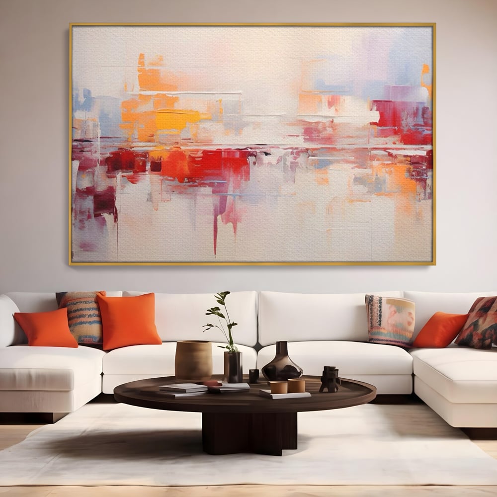 Tablou canvas cu pictura abstracta cu reflexii colorate, in rama de aluminiu auriu, pe perete intr-un living