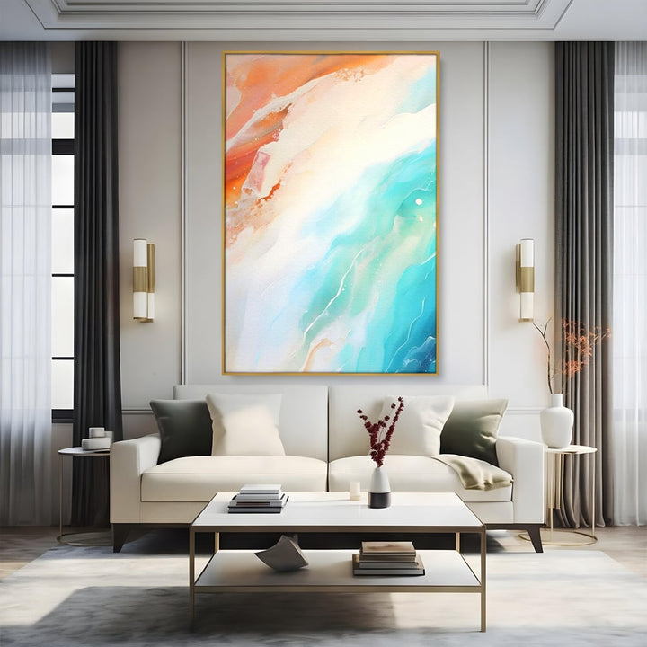 Tablou canvas cu pictura abstracta cu valuri turcoaz, in rama de aluminiu auriu, pe perete intr-un living