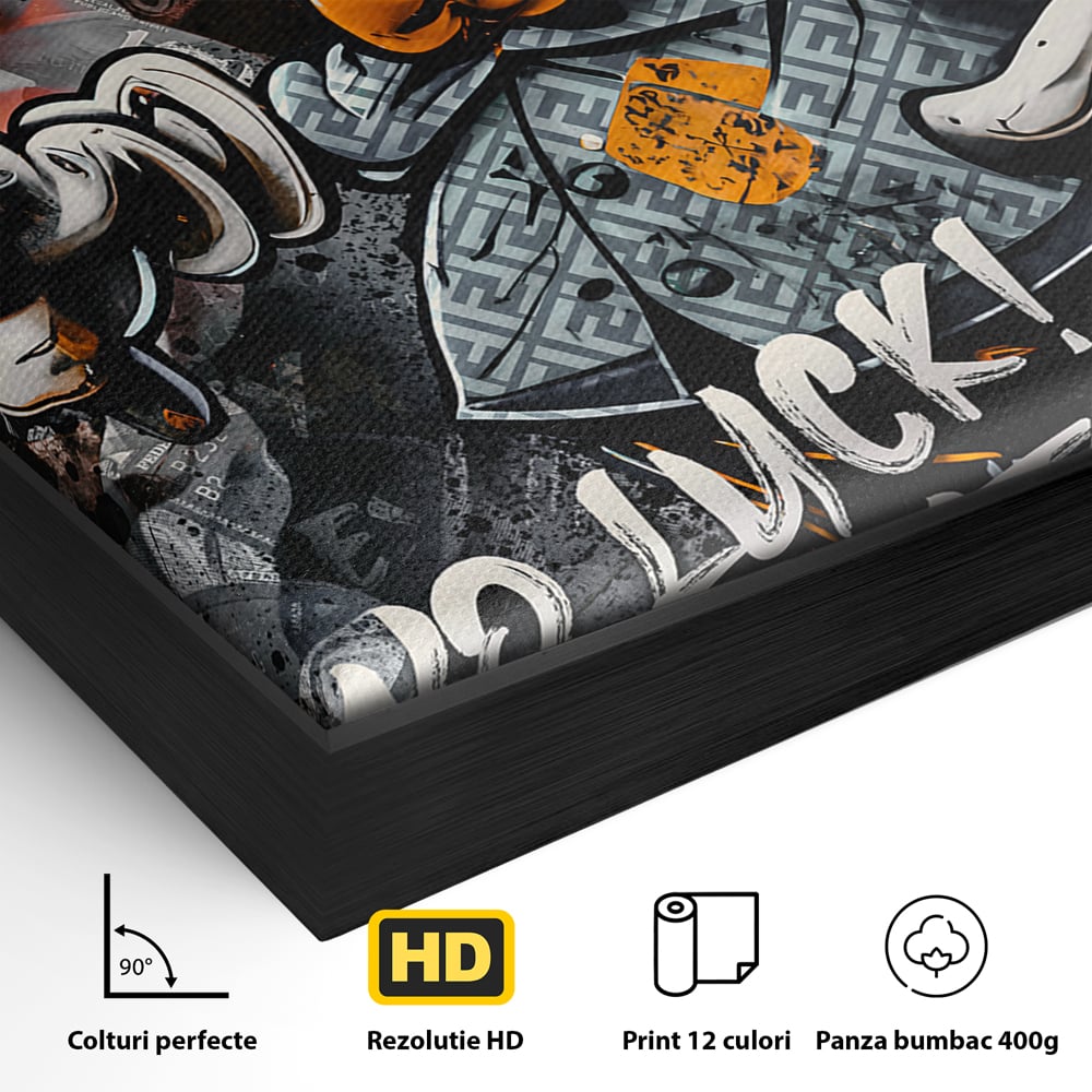 Detaliu al suprafetei: tablou canvas cu donald duck revoltat, in rama de aluminiu negru