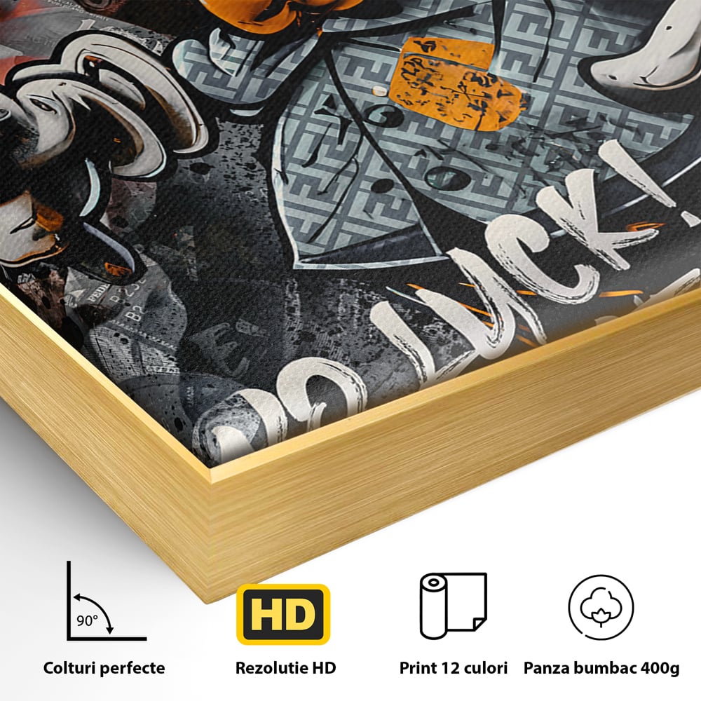Detaliu al suprafetei: tablou canvas cu donald duck revoltat, in rama de aluminiu auriu