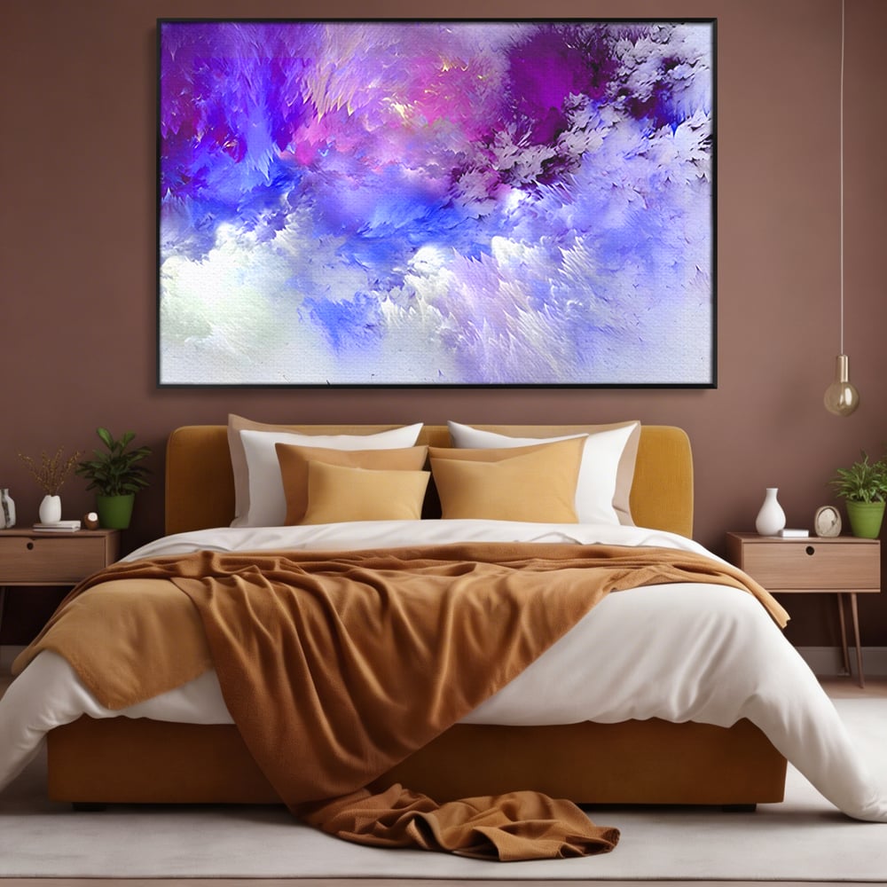 Tablou canvas cu pictura abstracta cu nori mov si albastri, in rama de aluminiu negru, pe perete intr-un dormitor