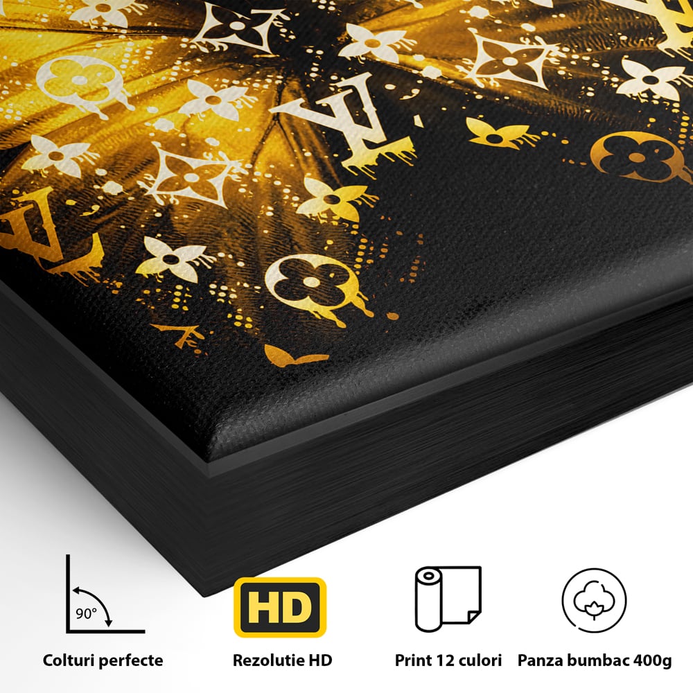Detaliu al suprafetei: tablou canvas cu fluture auriu, in rama de aluminiu negru
