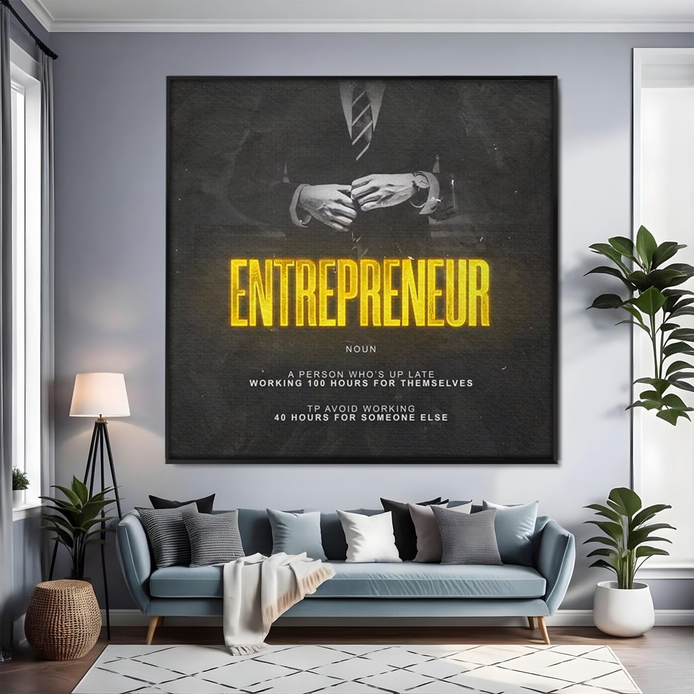 Tablou canvas cu ilustratie motivationala cu text si costum, in rama de aluminiu negru, pe perete intr-un living