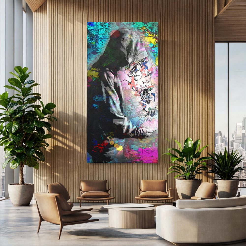 Tablou canvas cu tablou canvas cu baiat in hanorac, fara rama, pe sasiu de lemn, pe perete intr-un birou