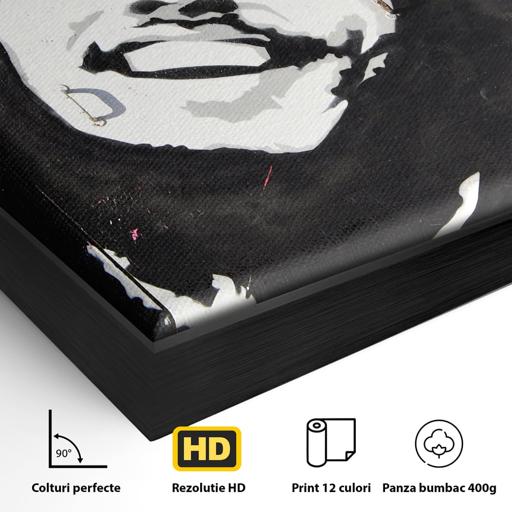 Detaliu al suprafetei: tablou pictat cu portretul lui bob marley, in rama de aluminiu negru