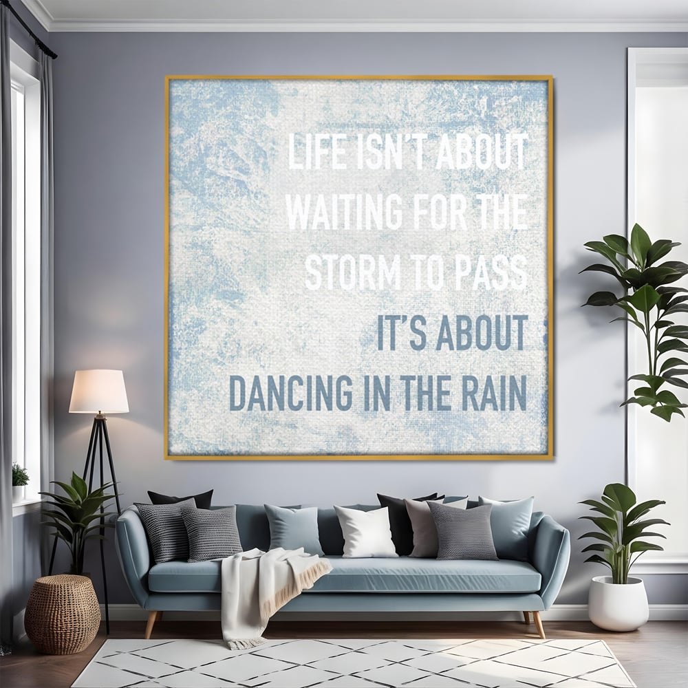 Tablou canvas cu tablou canvas cu mesaj motivational albastru, in rama de aluminiu auriu, pe perete intr-un living