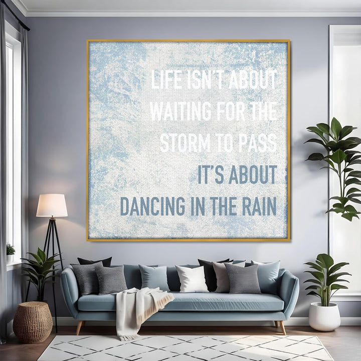 Tablou canvas cu tablou canvas cu mesaj motivational albastru, in rama de aluminiu auriu, pe perete intr-un living
