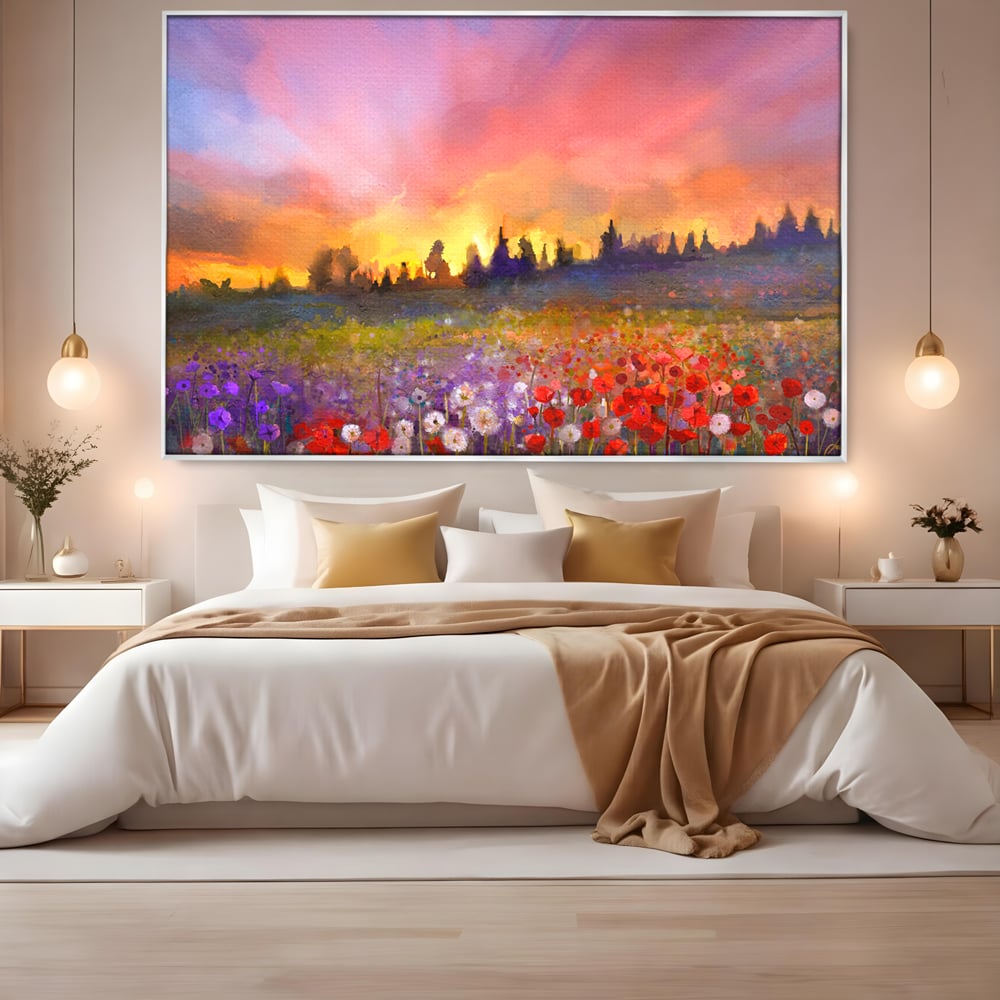 Tablou canvas cu tablou canvas cu camp cu flori si apus, in rama de aluminiu argintiu, pe perete intr-un dormitor