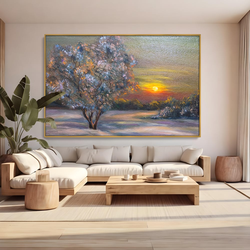 Tablou canvas cu pictura peisaj cu copac si apus, in rama de aluminiu auriu, pe perete intr-un living