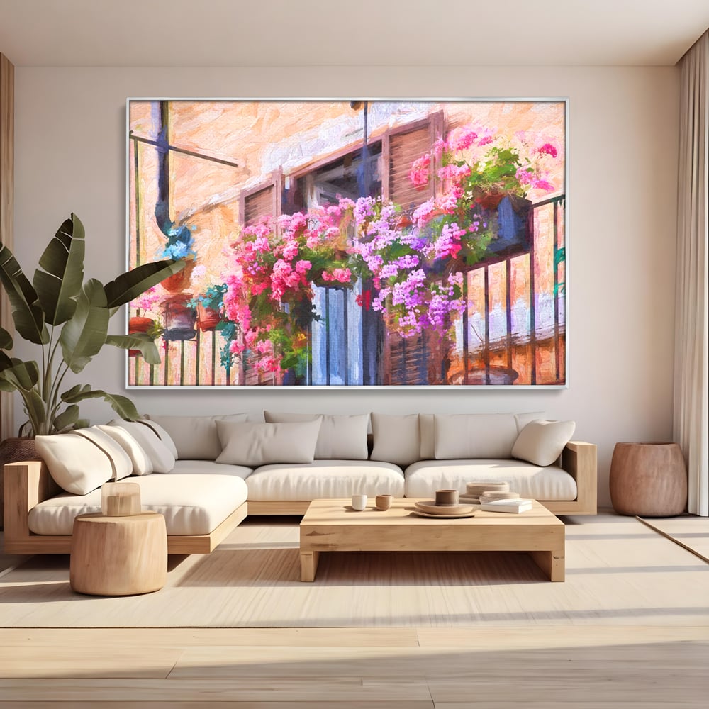 Tablou canvas cu pictura cu balcon plin de flori roz, in rama de aluminiu argintiu, pe perete intr-un living