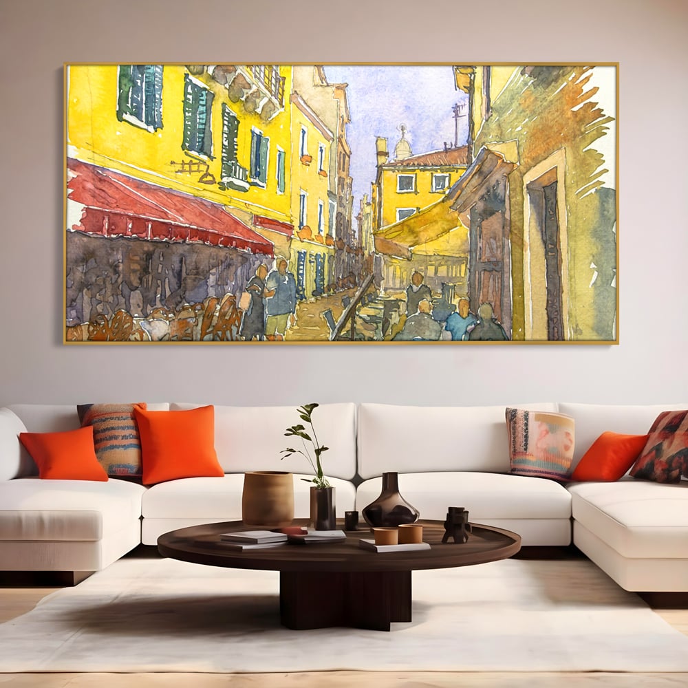 Tablou canvas cu pictura acuarela strada cu terase, in rama de aluminiu auriu, pe perete intr-un living