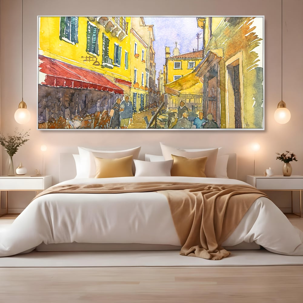 Tablou canvas cu pictura acuarela strada cu terase, in rama de aluminiu argintiu, pe perete intr-un dormitor