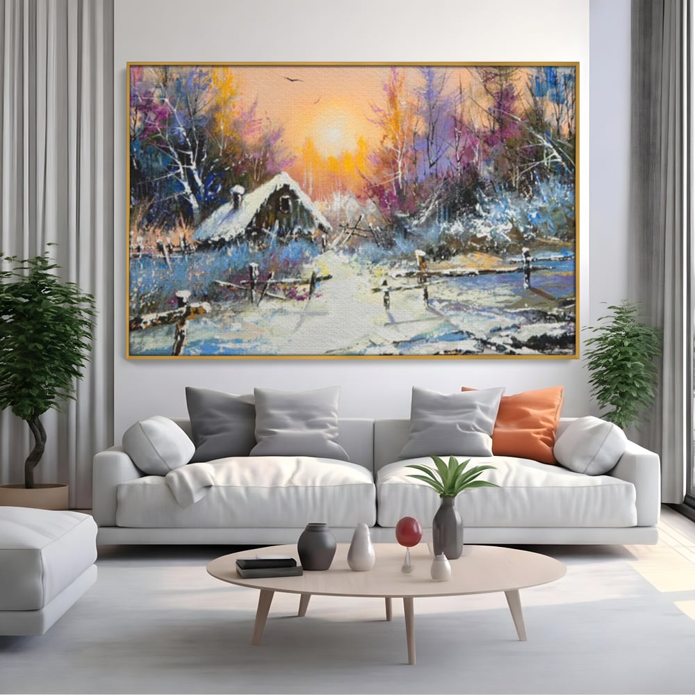 Tablou canvas cu tablou canvas cu peisaj de iarna, in rama de aluminiu auriu, pe perete intr-un living
