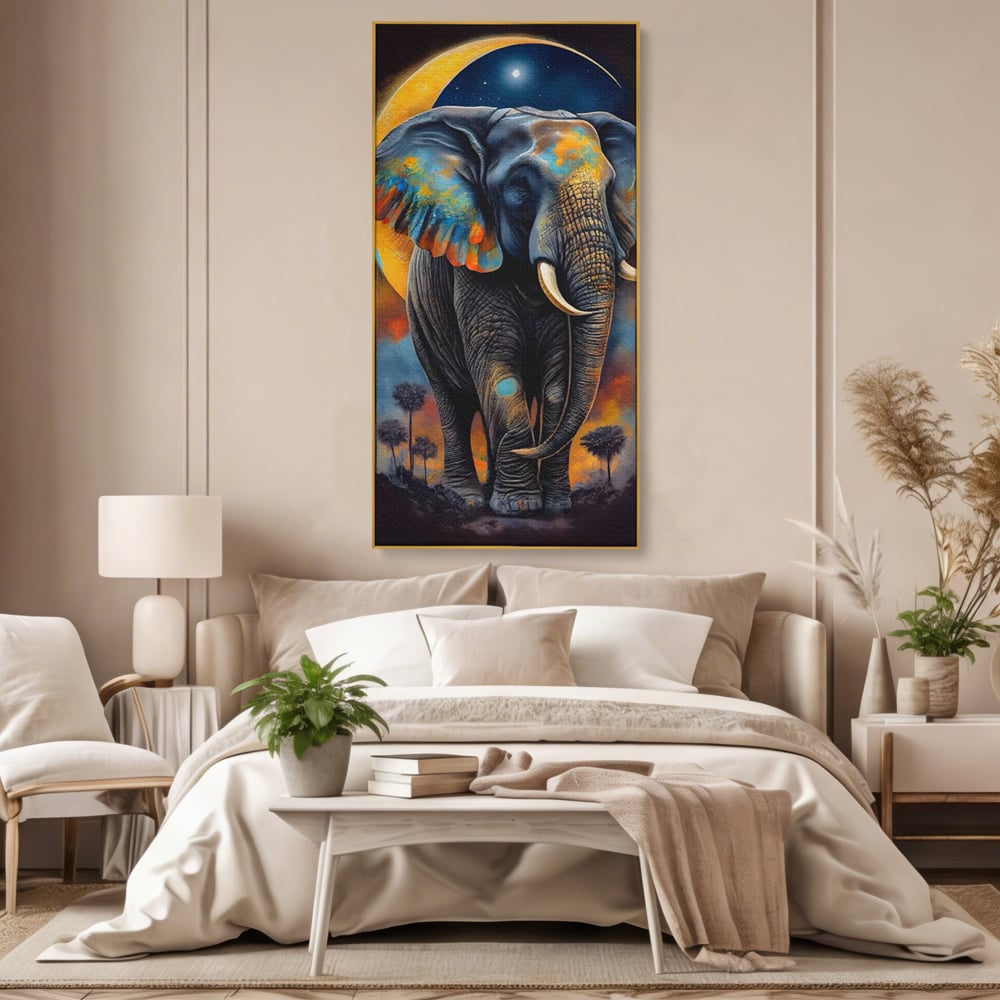 Tablou canvas cu tablou canvas cu elefant colorat si luna, in rama de aluminiu auriu, pe perete intr-un dormitor